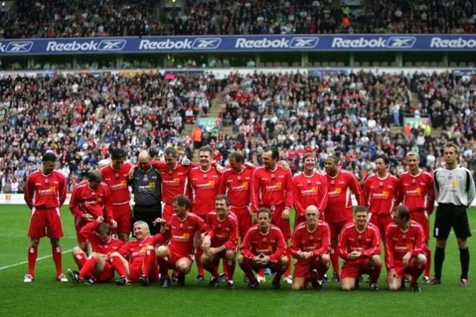 The Liverpool Legends squad lined up on the pitch at Anfield before the Tsunami Soccer Aid match